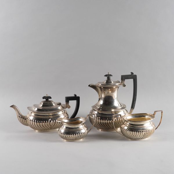 A SILVER FOUR PIECE TEA SET (4)