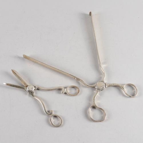 A PAIR OF SILVER SERVING TONGS AND A PAIR OF SILVER GRAPE SCISSORS (2)