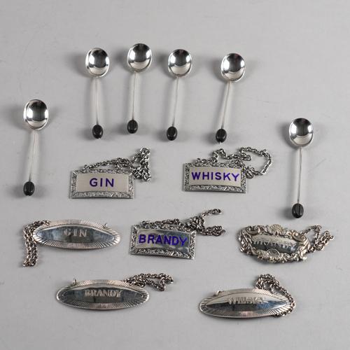 SEVEN SILVER DECANTER LABELS AND A SET OF SIX COFFEE SPOONS (13)