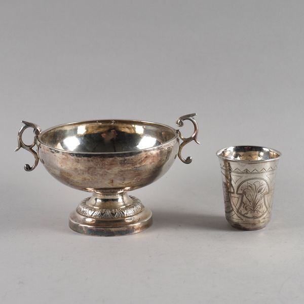 A TWIN HANDLED BOWL AND A BEAKER