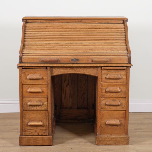 A MID-20TH CENTURY OAK ROLL TOP DESK