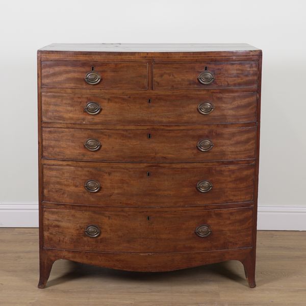 A REGENCY INLAID MAHOGANY BOW FRONT SIX DRAWER CHEST