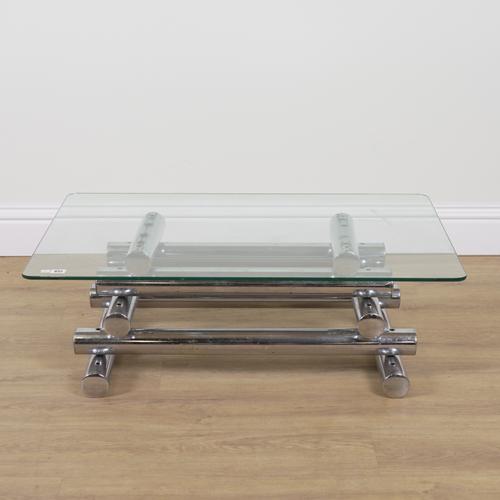 A MODERN GLASS AND CHROME RECTANGULAR COFFEE TABLE