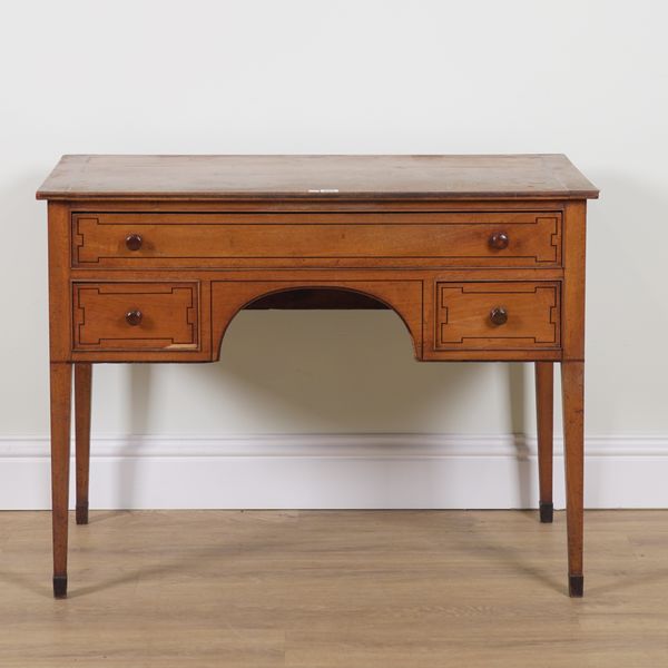 A GEORGE III FRUITWOOD THREE DRAWER WRITING DESK