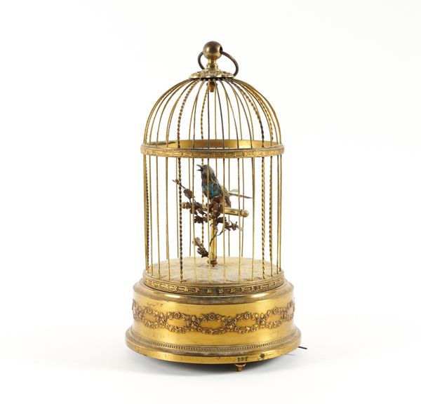 A FRENCH GILT-METAL SINGING BIRD AUTOMATON