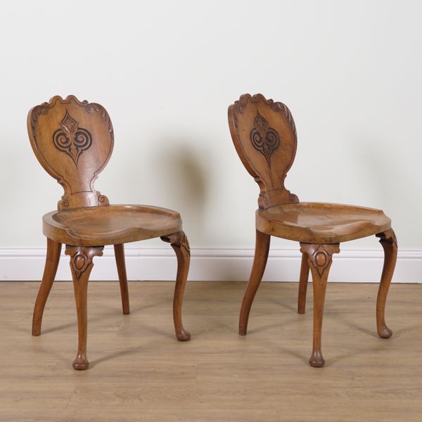 A PAIR OF VICTORIAN WALNUT HALL CHAIRS (2)