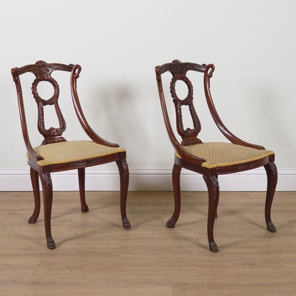 A PAIR OF MAHOGANY FRAMED TUB BACK SIDE CHAIRS (3)