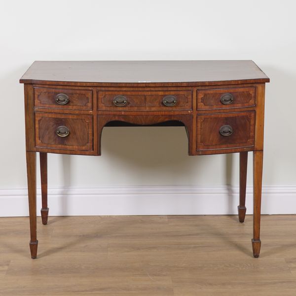 A GEORGE III AND LATER MAHOGANY BOWFRONT THREE DRAWER SIDE TABLE