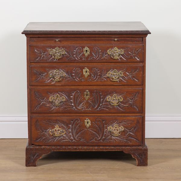 AN EARLY 19TH CENTURY CARVED PADOUCK FOUR DRAWER CHEST