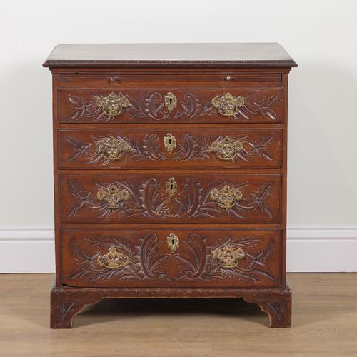 AN EARLY 19TH CENTURY CARVED PADOUCK FOUR DRAWER CHEST