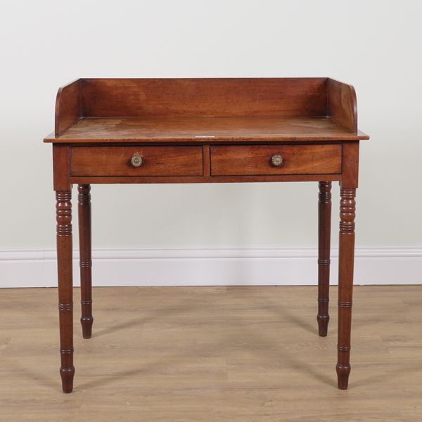 A REGENCY GALLERIED MAHOGANY TWO DRAWER WRITING TABLE