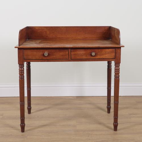 A REGENCY GALLERIED MAHOGANY TWO DRAWER WRITING TABLE