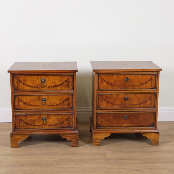 A PAIR OF MARQUETRY INLAID WALNUT THREE DRAWER BEDSIDE TABLES (2)