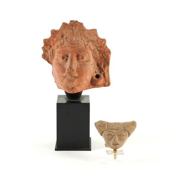 A MEXICAN POTTERY HEAD FRAGMENT AND ANOTHER FEMALE HEAD (2)