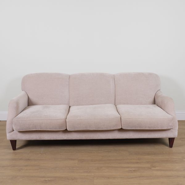 A MODERN THREE SEATER SOFA