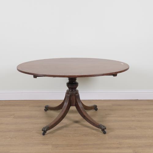 A GEORGE III ROSEWOOD BANDED OVAL MAHOGANY SNAP TOP CENTRE TABLE