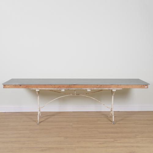 A LARGE RECTANGULAR MARBLE TOPPED SERVING TABLE
