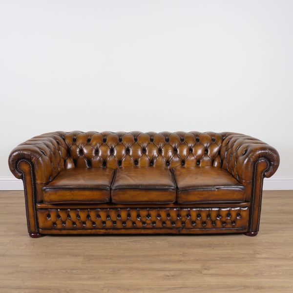 A MODERN BROWN LEATHER BUTTON UPHOLSTERED CHESTERFIELD SOFA