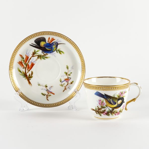 A LARGE ROYAL WORCESTER CUP AND SAUCER (2)