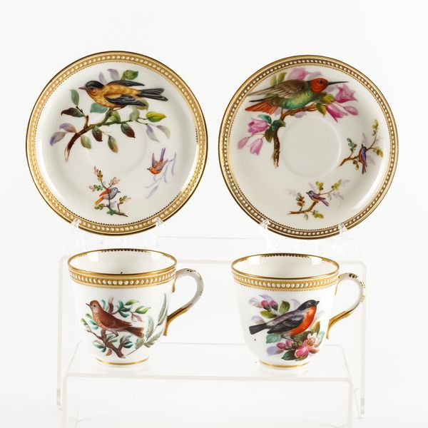 A PAIR OF ROYAL WORCESTER CUPS AND SAUCERS (4)