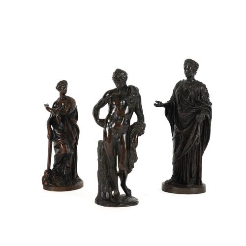 OF GRAND TOUR INTEREST: A GROUP OF THREE PATINATED BRONZE FIGURES OF GODS AND GODDESSES AFTER THE ANTIQUE (3)