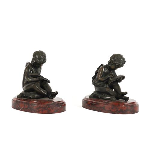 AFTER CHARLES GABRIEL LEMIRE (FRENCH, 1741-1827): TWO PATINATED BRONZE FIGURES OF BOYS READING AND WRITING