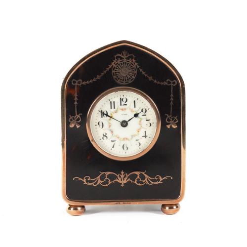 A TORTOISESHELL AND GOLD PIQUÉ MANTEL CLOCK