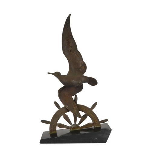 LAPEROU (?): AN ART DECO BRONZE FIGURE OF A SEAGULL FLYING ABOVE A SHIP’S WHEEL
