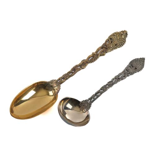A SILVER GILT SERVING SPOON AND A SILVER LADLE (2)