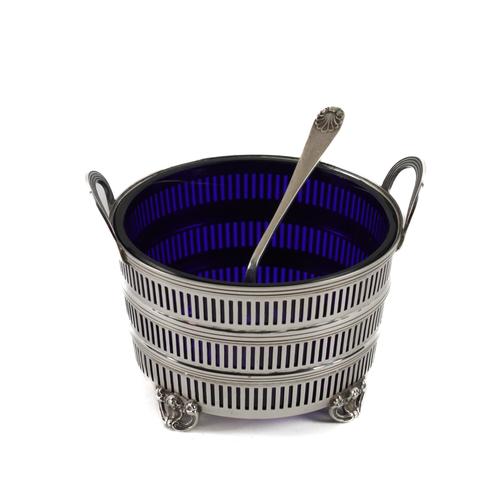 A SILVER TWIN HANDLED SUGAR BASKET AND A SILVER SUGAR SIFTING SPOON (3)