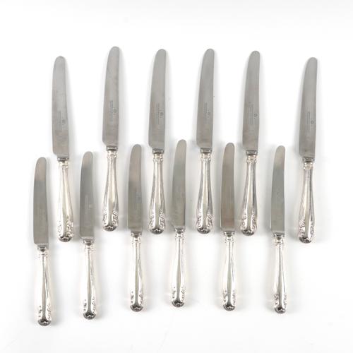 SIX STEEL BLADED TABLE KNIVES AND SIX STEEL BLADED CHEESE KNIVES (12)