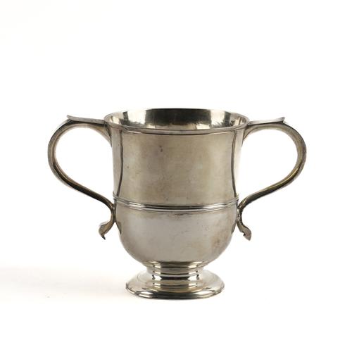 AN 18TH CENTURY SILVER TWIN HANDLED CUP