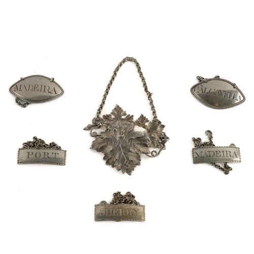 A GROUP OF SIX SILVER DECANTER LABLES (6)