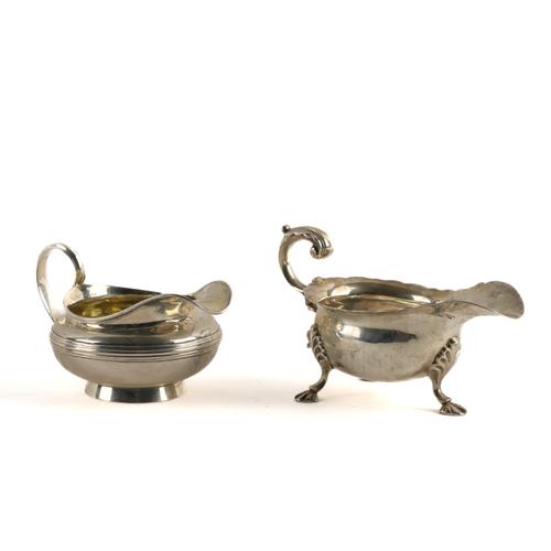 A SILVER MILK JUG AND A SILVER SAUCEBOAT (2)
