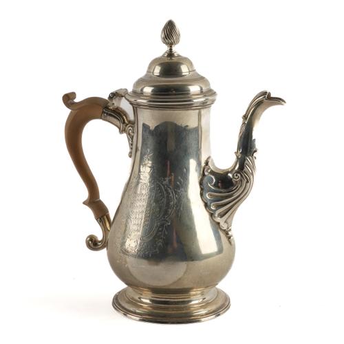 AN EARLY GEORGE III SILVER COFFEE POT