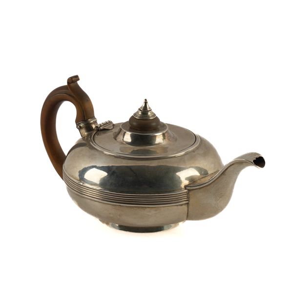 A GEORGE III SILVER TEAPOT