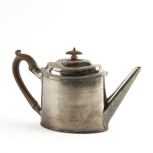 A GEORGE III SILVER TEAPOT