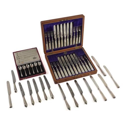 A SET OF SIX SILVER COFFEE SPOONS AND A SILVER PLATED DESSERT SET (2)