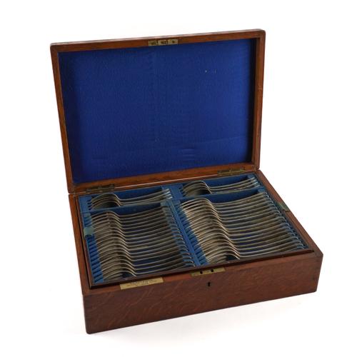 A MOSTLY LATE VICTORIAN SILVER CANTEEN OF OLD ENGLISH PATTERN TABLE FLATWARE