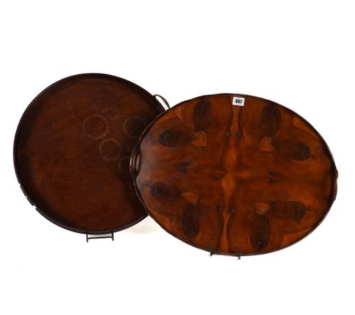 AN OYSTER VENEERED LABURNUM TWIN-HANDLED OVAL TRAY (2)