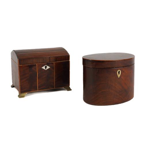 A REGENCY MAHOGANY AND ROSEWOOD COFFER SHAPED TEA CADDY (2)