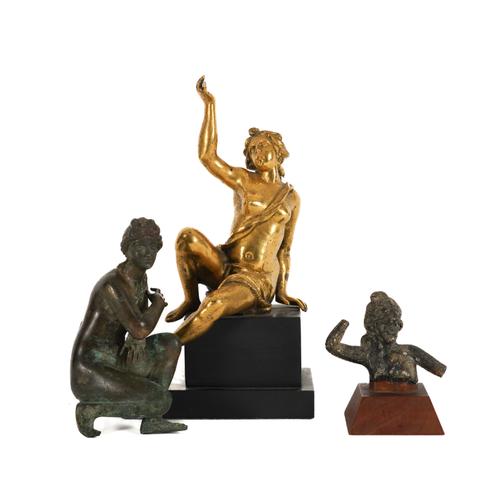 OF GRAND TOUR INTEREST: A PATINATED BRONZE STAUTETTE OF THE CROUCHING VENUS AND ANOTHER GILT-BRONZE SEATED FIGURE (3)