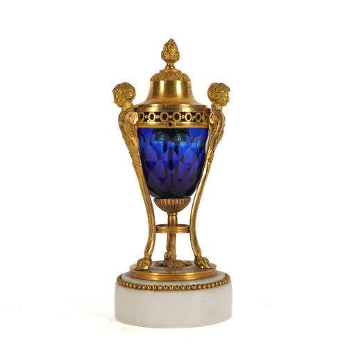 A NEO-CLASSICAL GILT-BRONZE MOUNTED BLUE GLASS CASSOLETTE VASE