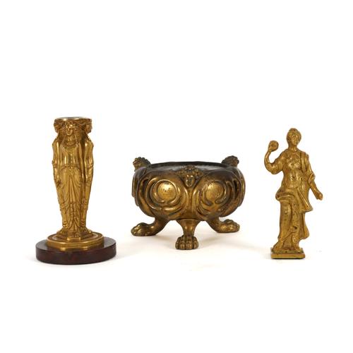 AN ORMOLU CARYATID BASE OF THE THREE GRACES AND ANOTHER GILT-BRONZE STATUETTE (3)