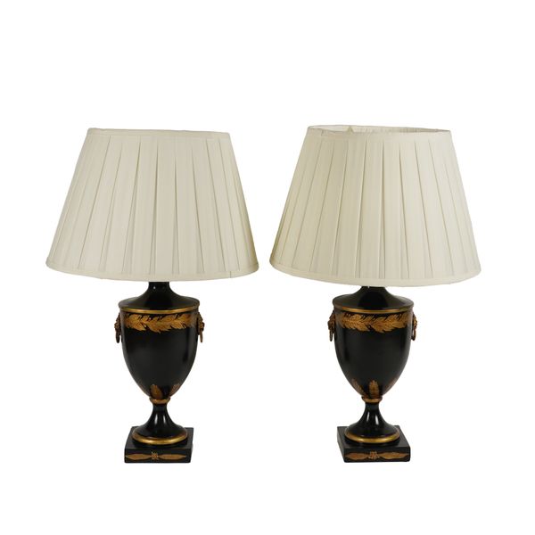 A PAIR OF NEO-CLASSICAL STYLE PARCEL GILT DECORATED BLACK COMPOSITE TABLE LAMPS (2)