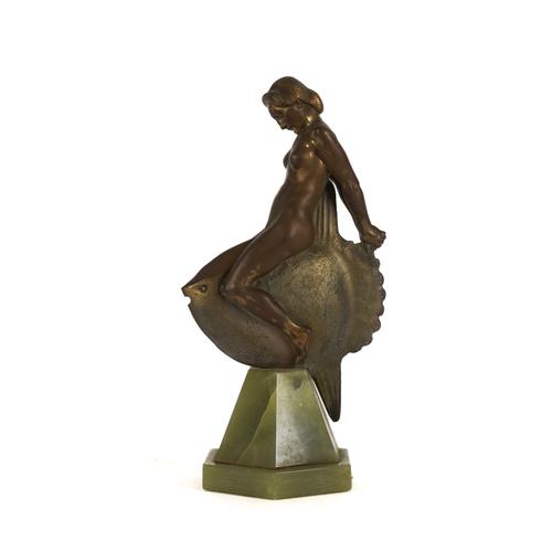 ADOLF JOSEPH POHL (1872-1930): AN ART DECO GILT PATINATED BRONZE OF A NAKED FEMALE ASTRIDE A SUN FISH