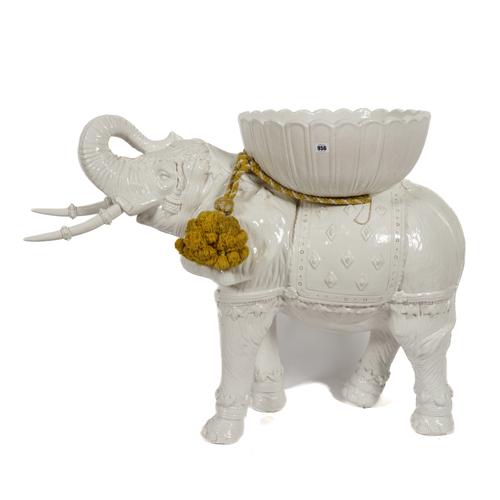 A WHITE CRACKLE GLAZED MODEL OF  FLOOR STANDING ELEPHANT POSSIBLY A JARDINIERE