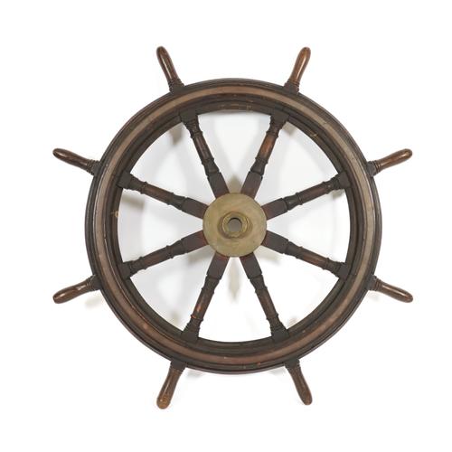 AN ENGLISH TEAK SHIP'S WHEEL