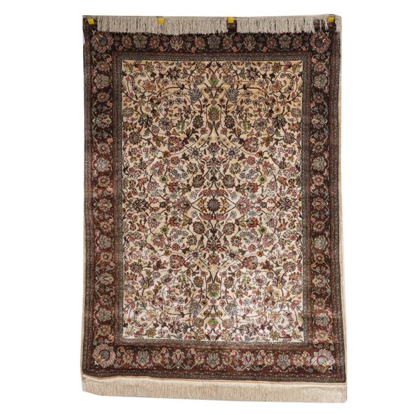 A CHINESE SILK RUG