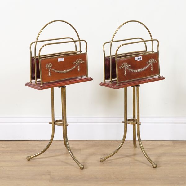 A PAIR OF MID 20TH CENTURY BRASS AND MAHOGANY TWIN DIVISION MAGAZINE STANDS (2)
